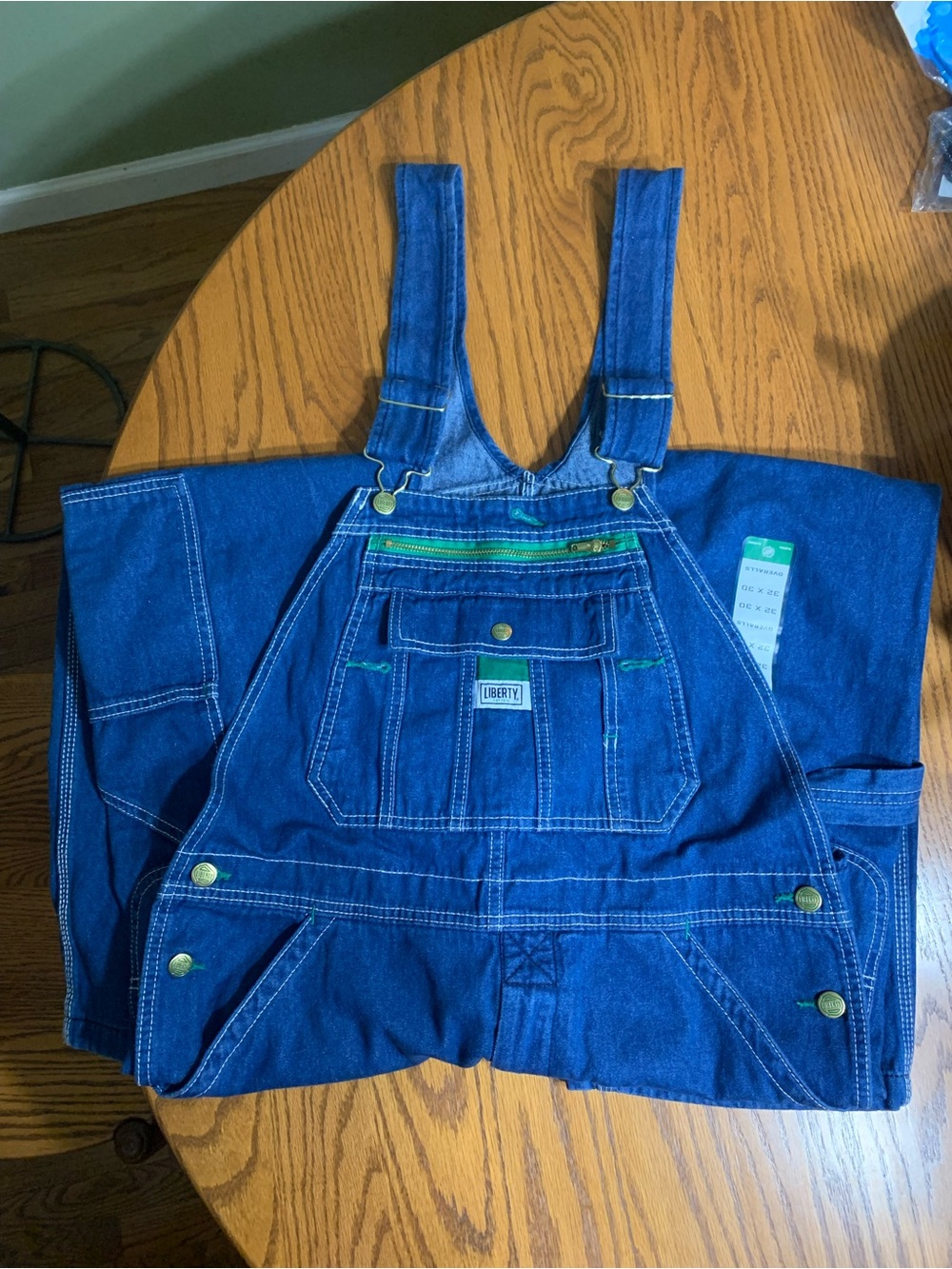 Men’s Liberty denim bibs in size 32X30.